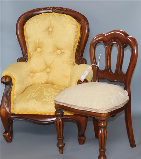 A Victorian style miniature easy chair with deep-buttoned upholstery and a similar miniature dining chair Height of tallest 53cm